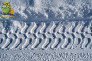 Tire snow tracks of a moving van